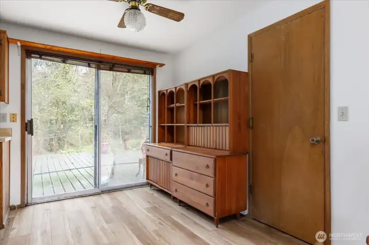Sliding door to large deck off of kitchen and dining area.