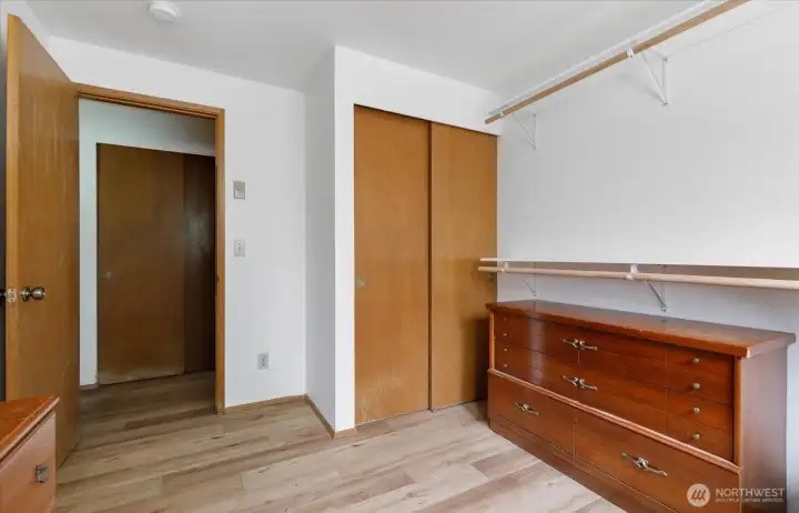 Bedroom 1 with view of convenient hall closet