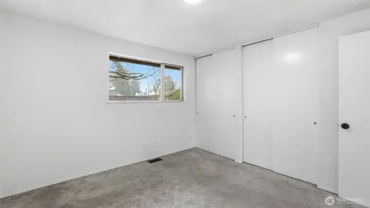 Primary bedroom with dual closets