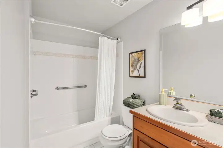 hall bath - these are newer vanities and all new doors and finishes.