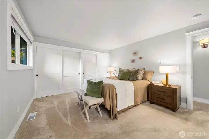 another view of the primary bedroom