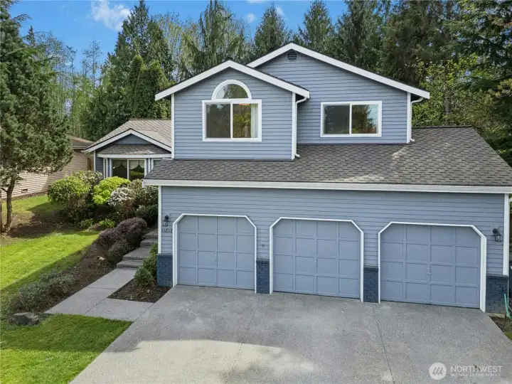 Three-car garage with ample storage