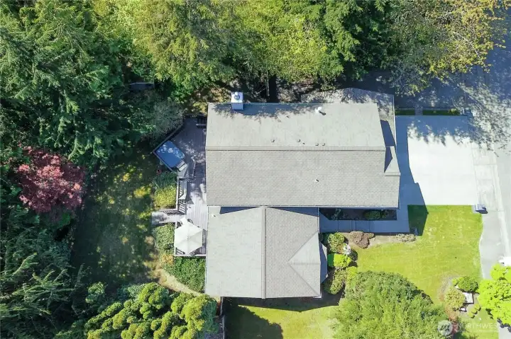 Spacious .27-acre greenbelt setting with mature landscaping