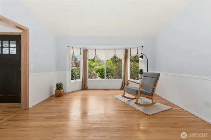 Bright formal living room filled with natural light