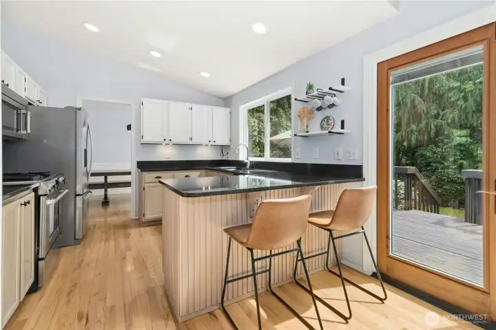 Kitchen featuring updated fixtures and appliances