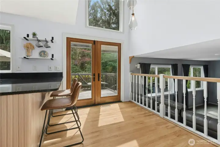 Light-filled kitchen with views of the backyard