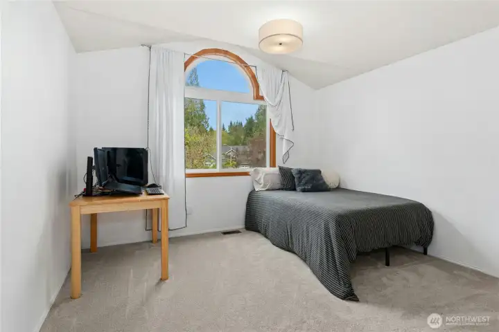 Additional upstairs bedroom with bright outlook