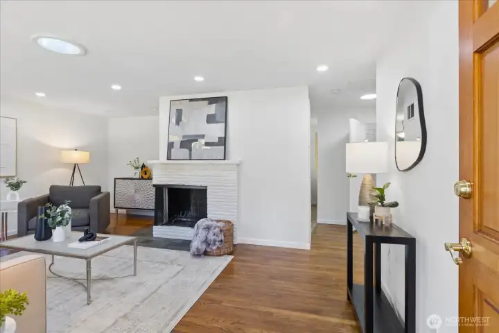 Hardwoods greet you at the entry into the large living room.
