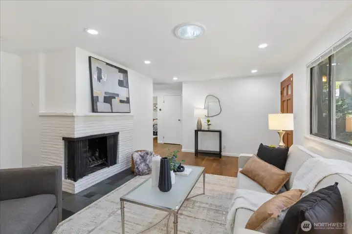 Wood burning corner style fireplace.