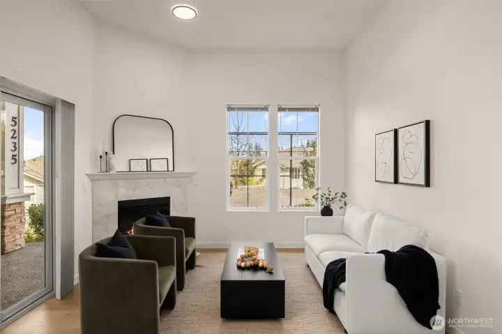 Gas fireplace and rich wood floors. Quiet corner unit.