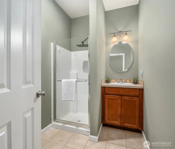 Main floor 3/4 bathroom adjacent to the office/bedroom.