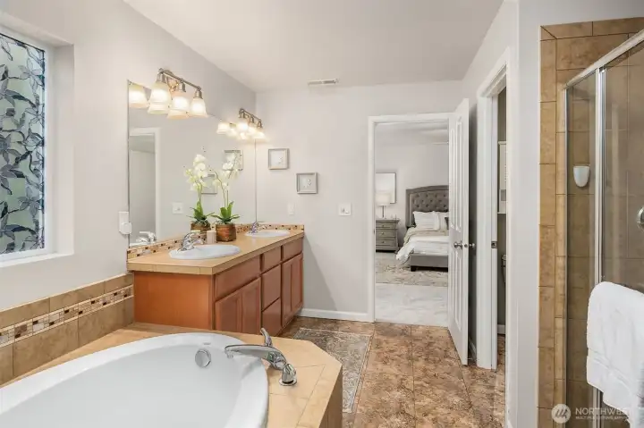 5 Piece Primary Bathroom and walk-in closet.