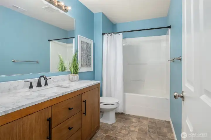 2nd Level full bathroom with new vanity.
