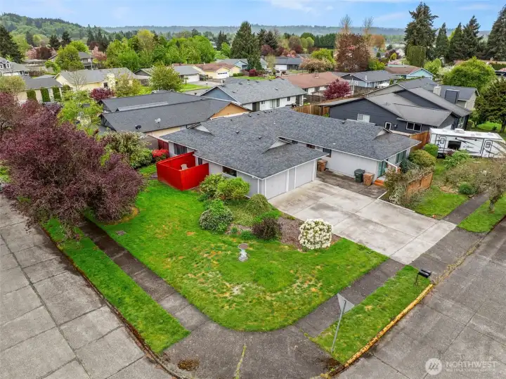 Looking at the side yard and unit 1 patio.