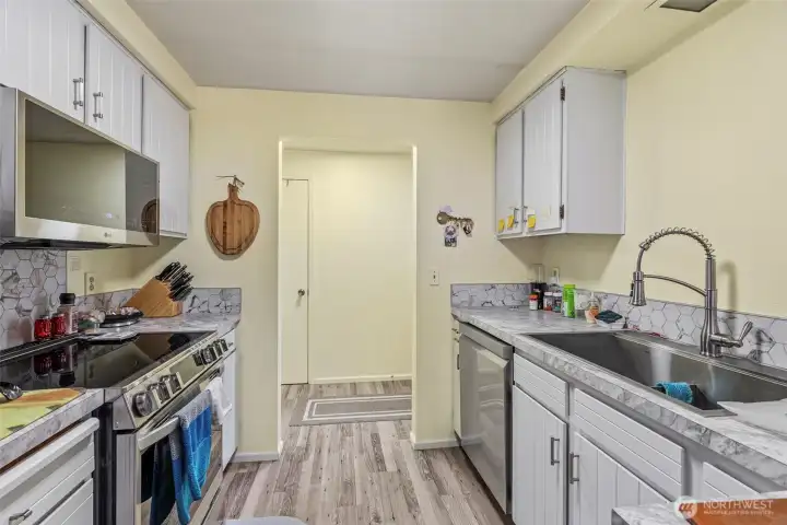 Fresh, clean kitchen with new appliances and functional layout, New LG appliances that will stay with the units.