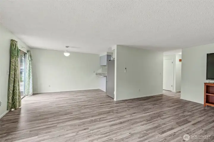 Open-concept layout connecting the living and dining areas for easy flow