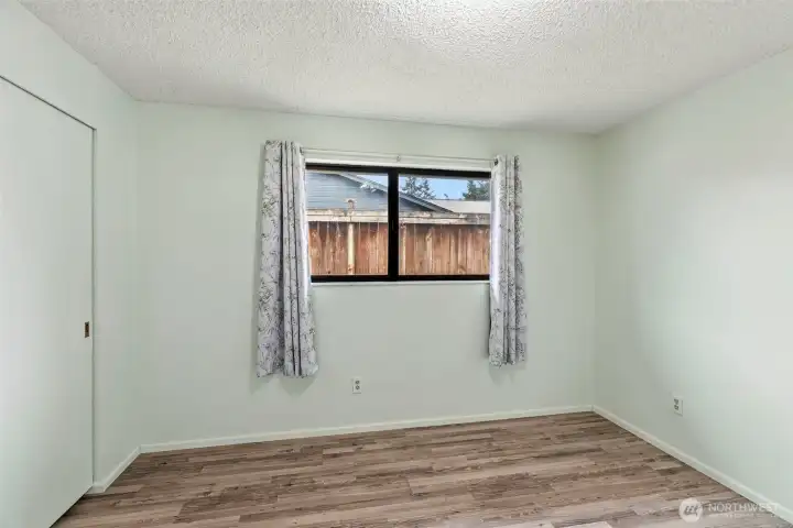 Well-sized second bedroom with flexible use options