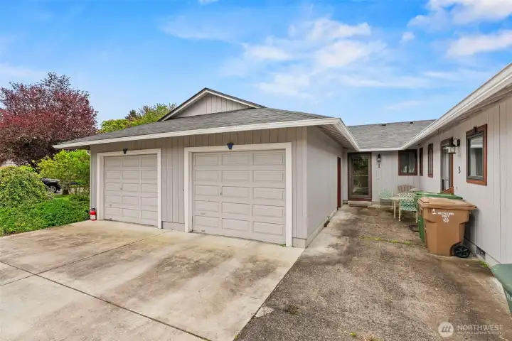 Individual garage for each unit providing secure parking and storage.
