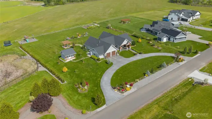 Aerial view of property and home