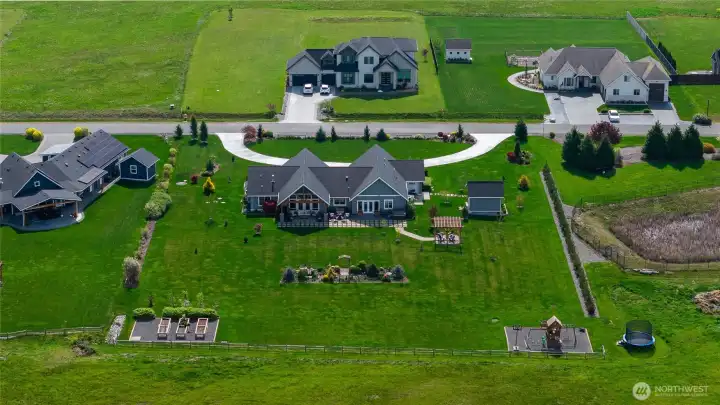 Aerial view of property and home
