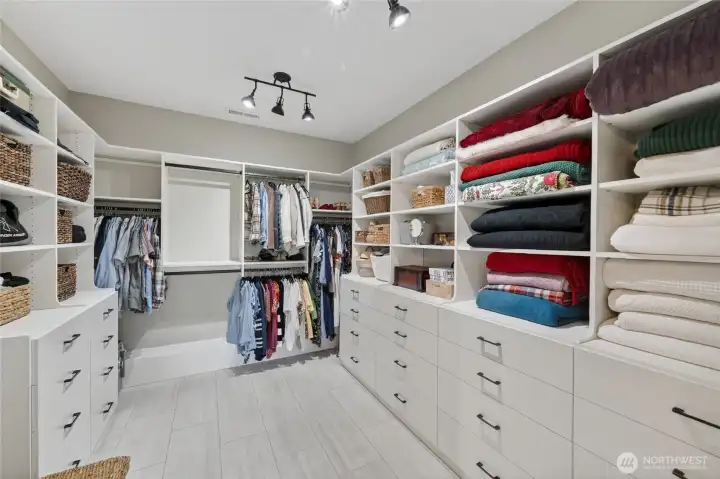 Primary bedroom walk-in closet