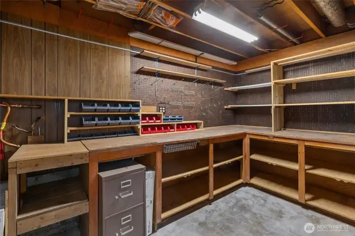 Downstairs tool shop or storage space