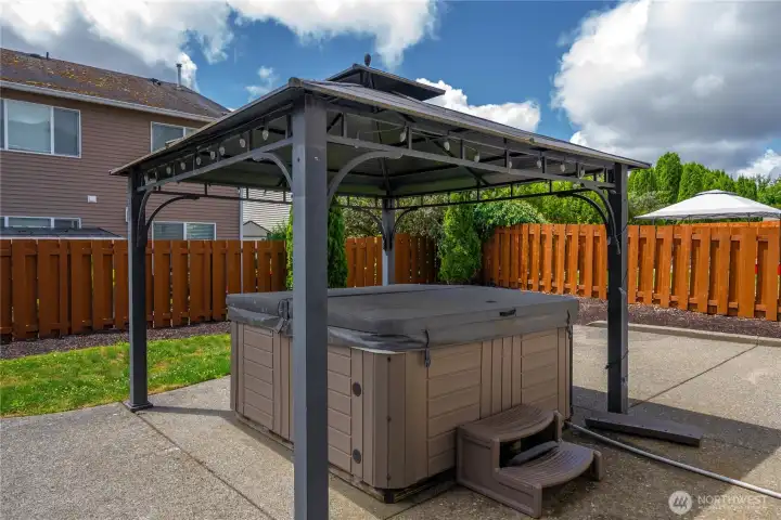 Hot tub with gazebo. Hot tub with gazebo.