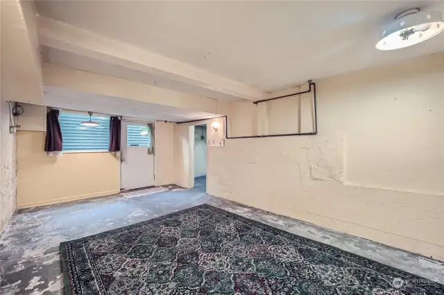 This is the largest and  best room on the lower level that could be converted to the 4th bedroom with its own entrance or use this as a living room for an ADU in the basement.