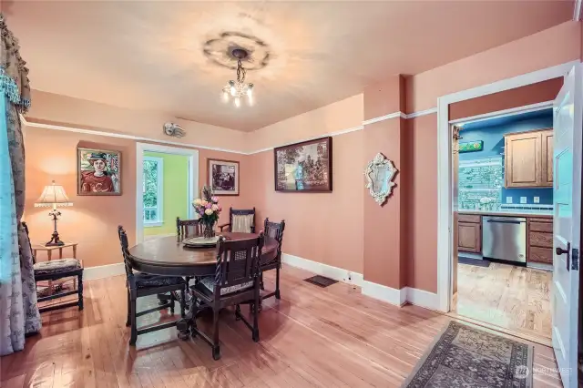 Heart of the home is the formal dining room with gleaming fir floors