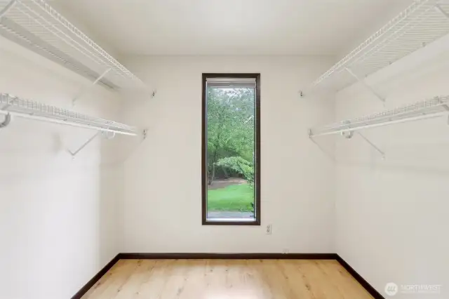 Walk in closet in primary bedroom