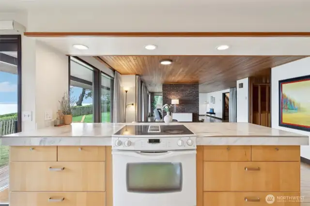Open kitchen with Jenn-Air range.