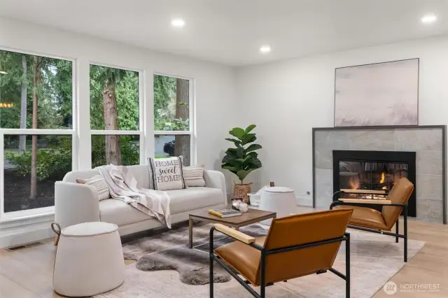 Living room is full of natural light and is a beautiful open space.