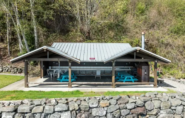 Community cabana with sinks, running water, BBQs, tables, etc