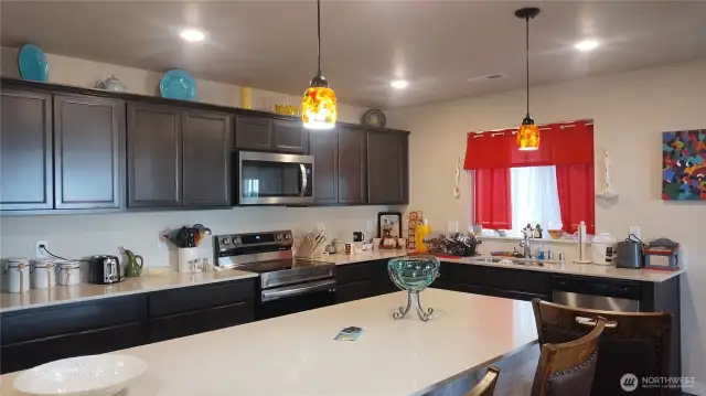 The kitchen is very large and has a pantry