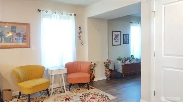The foyer leads to the great room-to the right of this photo is the front entry.