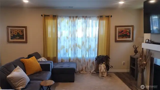 The living room has a gas fireplace