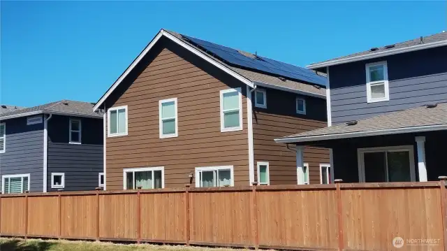 The south side of the house has the solar panels on the roof