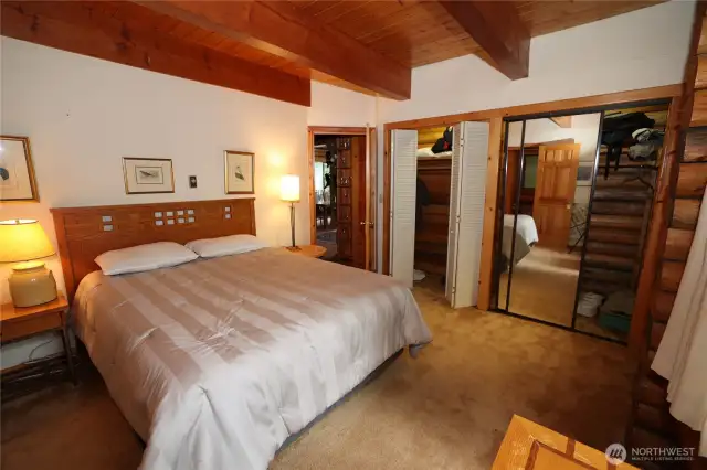 Main level bedroom with attached bathroom