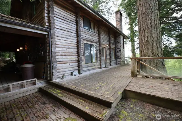 Main level deck wraps all the way to the hot tub
