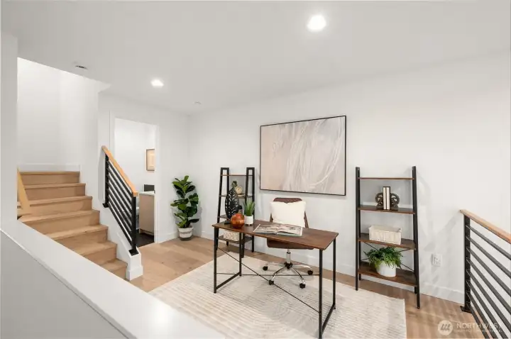 This bonus area is perfect for a second lounge, home office, or workout zone.