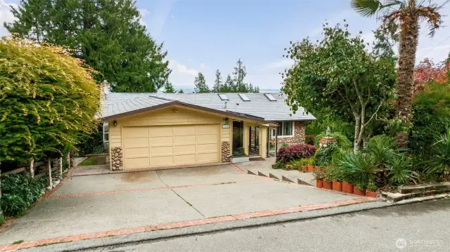 Large driveway with a 2 car garage