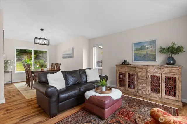 These lovely floors are fuss-free and very hardy. Update light fixtures throughout!
