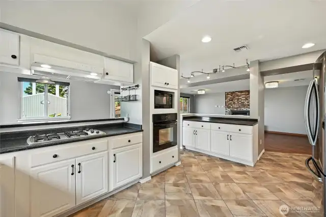 Plenty of storage, nice white cabinets and a large island