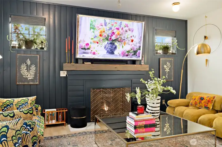 Another look at the stunning fireplace area—a space that invites connection, celebration, and comfort. Whether you're gathering with friends and family to share stories and laughter, or enjoying a quiet evening curled up in the peaceful glow of home, this room was designed to hold life’s everyday moments and meaningful memories alike.