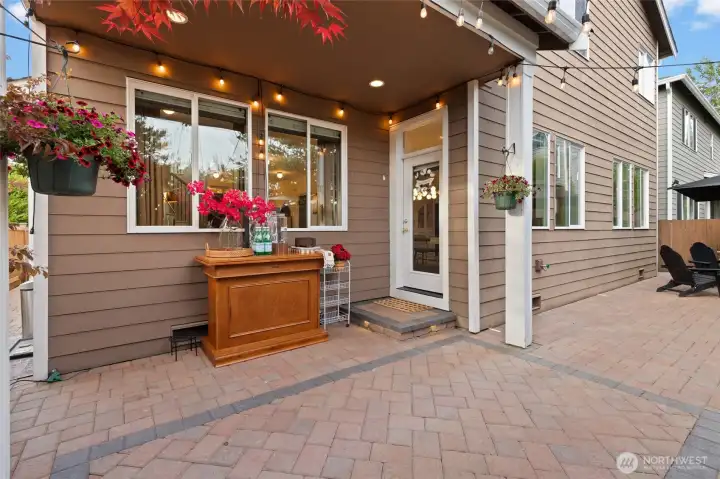 Enjoy effortless outdoor living in this beautifully designed, low-maintenance backyard. The expansive paver patio means you’ll never need to mow, and integrated paver lighting adds evening ambiance. A covered BBQ area makes year-round grilling a breeze, while the southern exposure ensures warm, sunlit afternoons. Fully fenced for privacy and security—perfect for entertaining, relaxing, or simply enjoying a quiet moment at home.