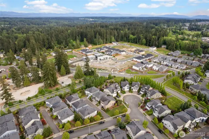 This vibrant community offers the perfect blend of nature, convenience, and connection. With two spacious parks, winding sidewalks, and a welcoming neighborhood feel, it's ideal for morning strolls, bike rides, or gathering with neighbors. Located within walking distance to Fernwood Elementary and served by the highly rated Northshore School District—including North Creek High School—this location combines top-tier education with everyday livability. A perfect setting to put down roots and enjoy a true sense of community.