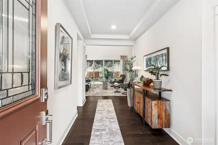 Step inside to a grand and open entryway.  With a view to the back yard.