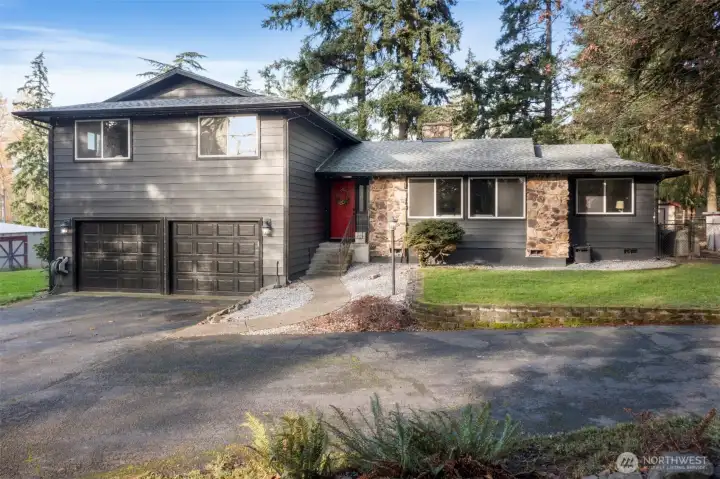 Welcome to this exceptional turn-key horse property on almost 5 acres. Gated entry and paved drive welcome you to this thoughtfully laid out equestrian experience.