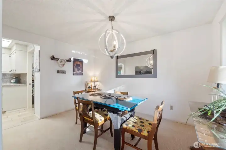 The formal dining area has country charm and is located right off of the kitchen for easy entertaining.