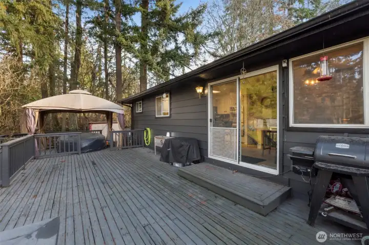 Relax in the hot tub at the end of the day. This enormous deck offers plenty of space for entertaining and great BBQs!